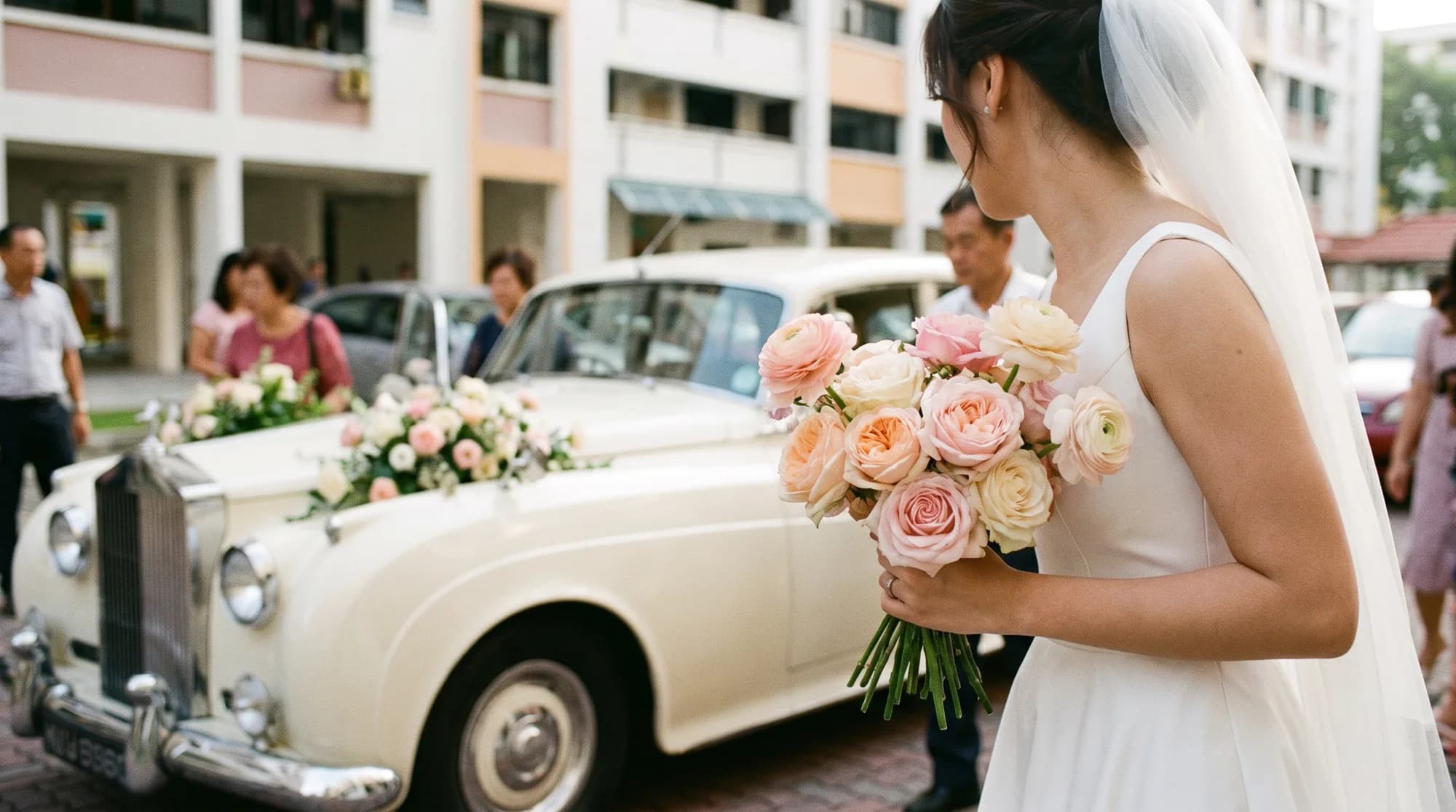 A Singaporean Chinese bride holding a fresh pastel bridal bouquet of garden roses and ranunculus